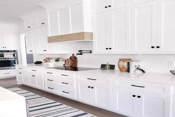 Black Handles and Knobs in a Spacious Kitchen