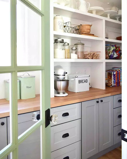 Black Hardware in a Bright Pantry
