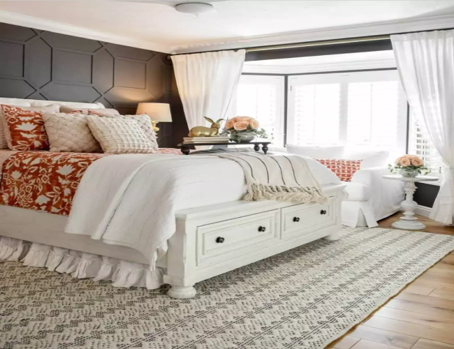 Red and White Accent Pillows on a White Bedroom Chair