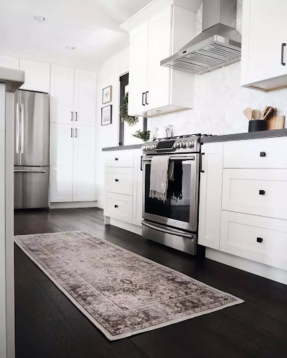 Square Black Kitchen Knobs in a White Kitchen