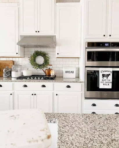 White Cabinets with Dark Kitchen Countertops