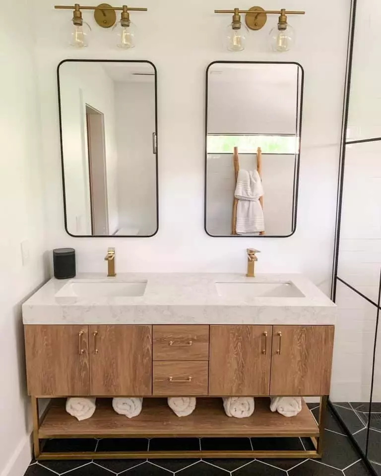 Black Hexagon Bathroom Floor with Wood Cabinetry