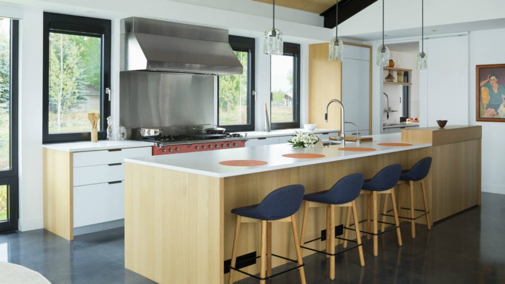 Cottage Galley Farmhouse Kitchen with Concrete Stained Floor