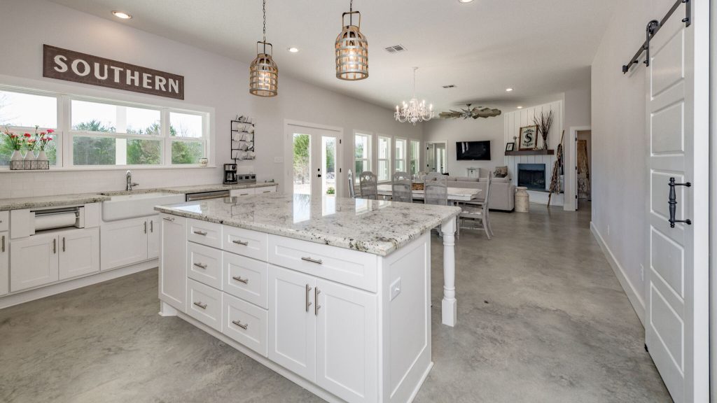 Farmhouse Kitchen style with a U-Shaped Concrete Floor