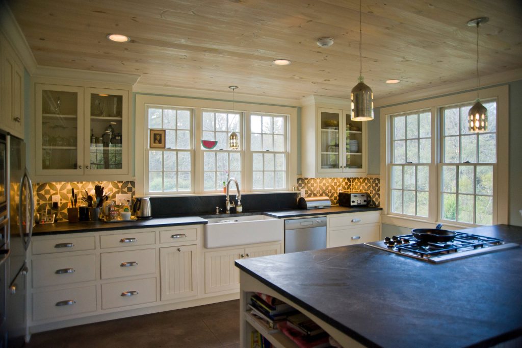 Farmhouse Style Galley Kitchen with Soapstone Kitchen Island