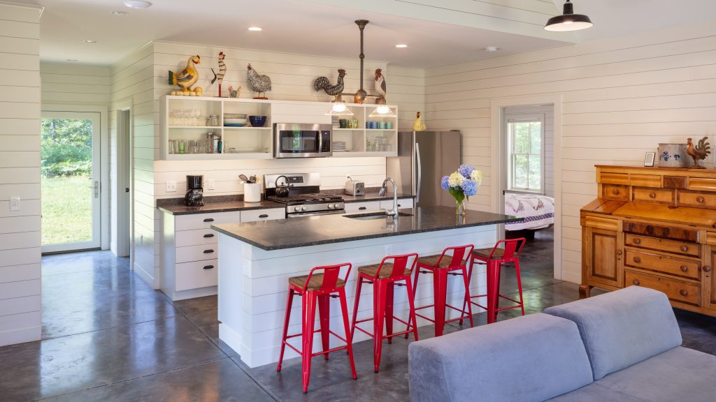 Guest Cottage Kitchen with Stained Concrete Flooring