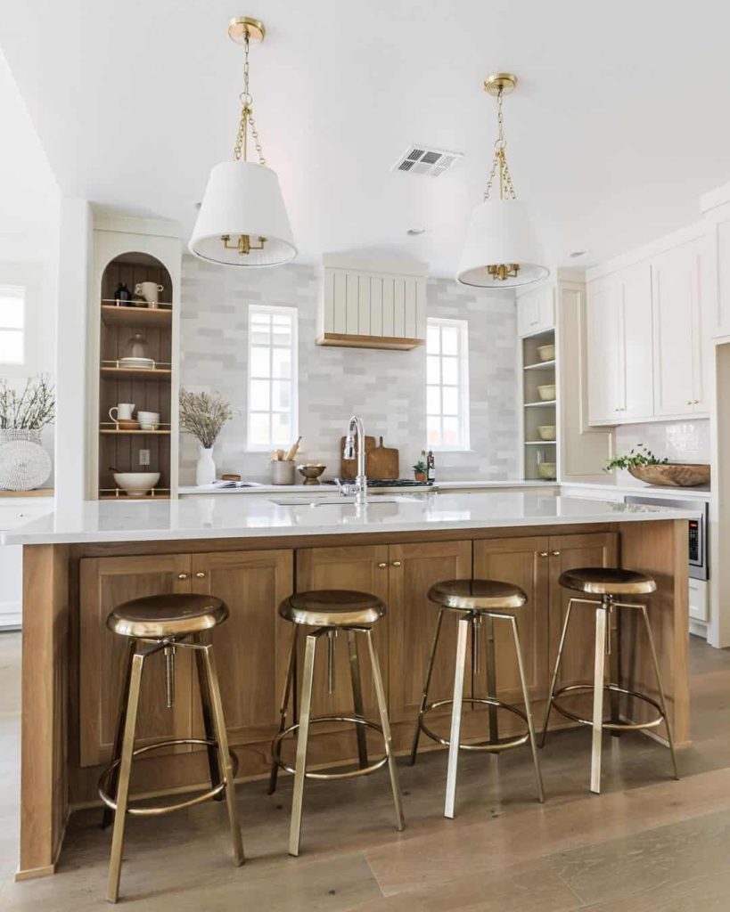 Kitchen Island with Muted Tones and Shiney Seating