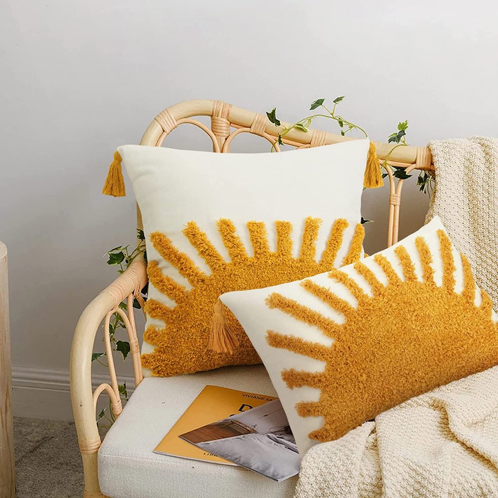 Yellow White Lumbar Shaped BOHO Throw Pillow on a Couch